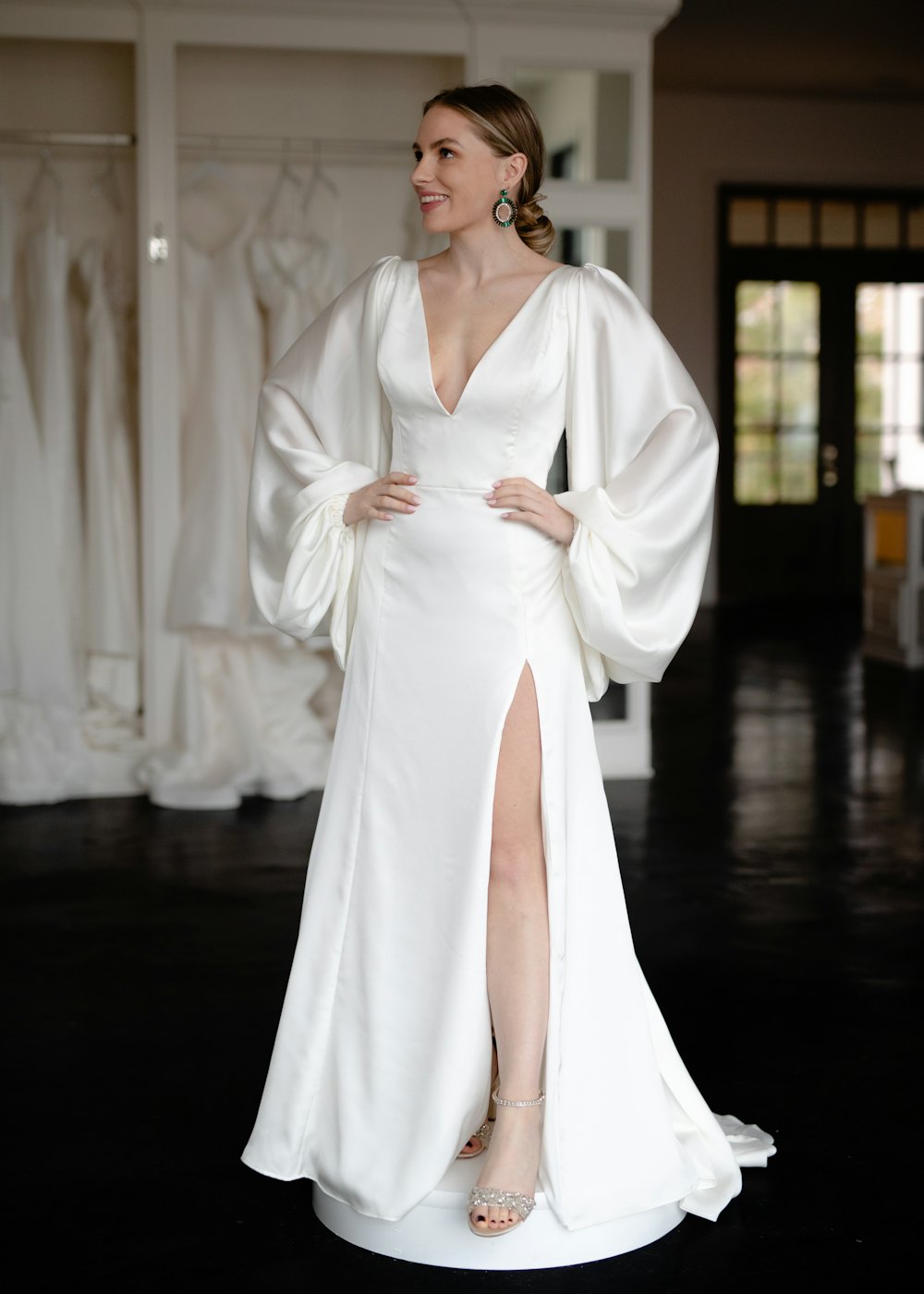 Satin evening gown with full sleeves