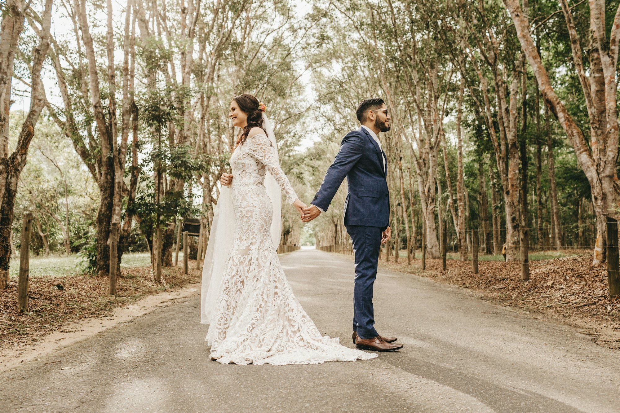 Couple on a tree-lined road